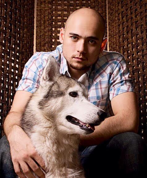 Ryan Eigenmann with his Siberian Husky