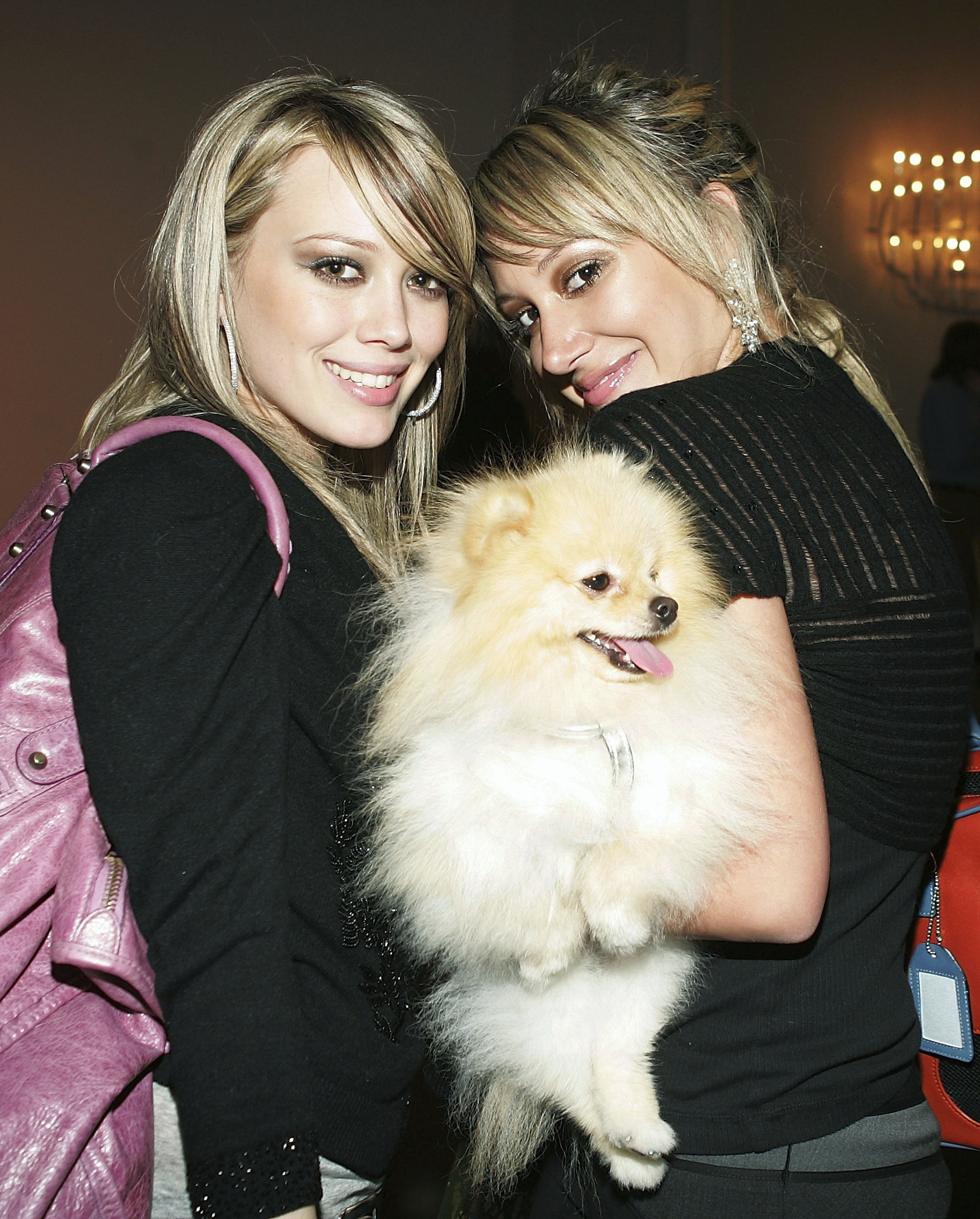 Hilary Duff with another woman carrying her Pomeranian