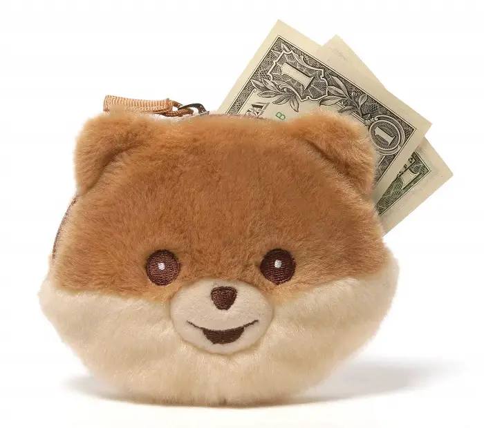 cute Pomeranian face plush coin purse with a dollar in it