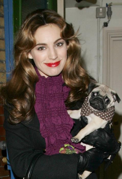 Kelly Brook with her pug in her arms