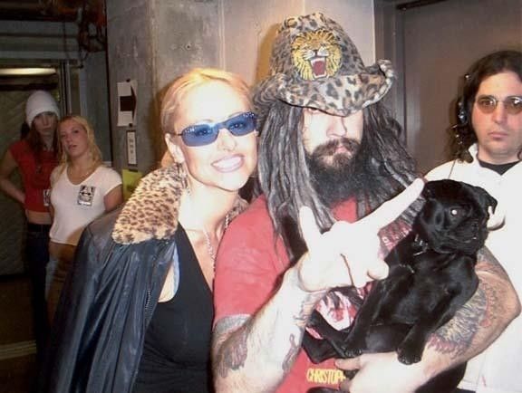 Rob Zombie with his pug in his arms