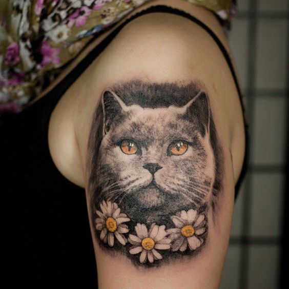 3D face of Realistic Cat with daisies Tattoo on the shoulder