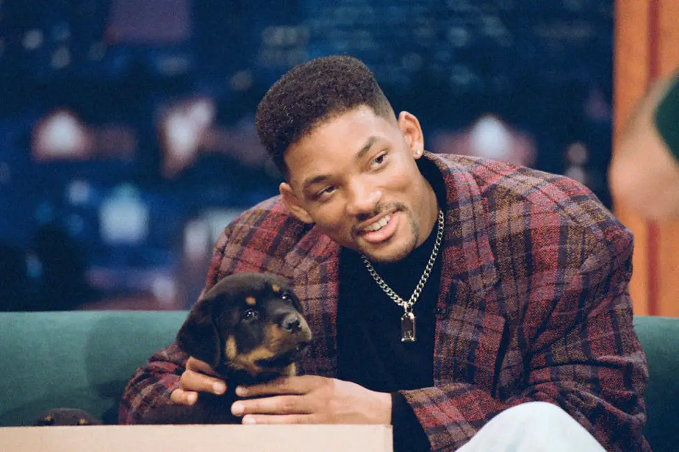 Will Smith in a talk show sitting with his Rottweiler puppy