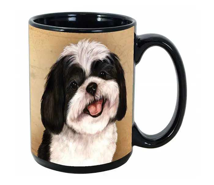 A black coffee mug with the face of a Shih Tzu