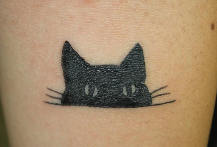 half face of black cat tattoo