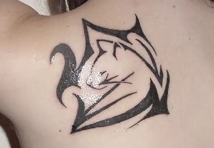 A Tribal Cat Tattoo on the back
