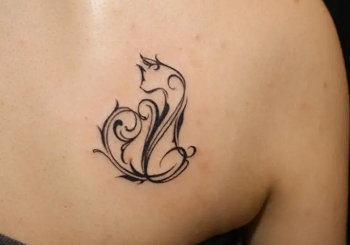 A Tribal Cat Tattoo on the back