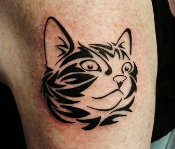 face of a Tribal Cat Tattoo on the shoulder