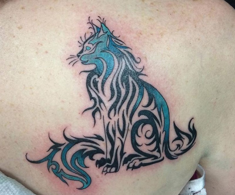 A sitting Tribal Cat Tattoo on the back