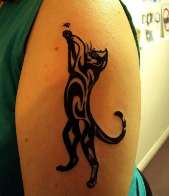 A Tribal Cat Tattoo on the shoulder