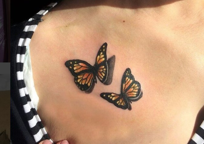 two 3D monarch butterfly tattoo on chest