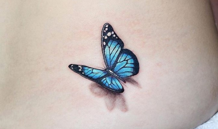 Blue 3D butterfly tattoo