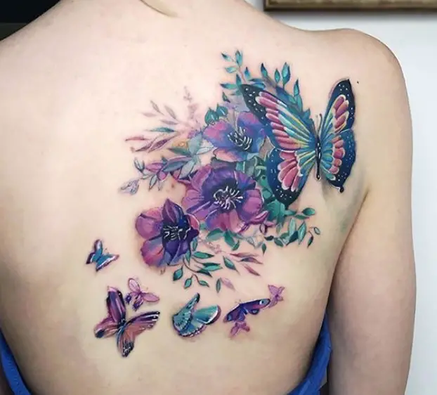 colorful butterflies with flowers tattoo on the back