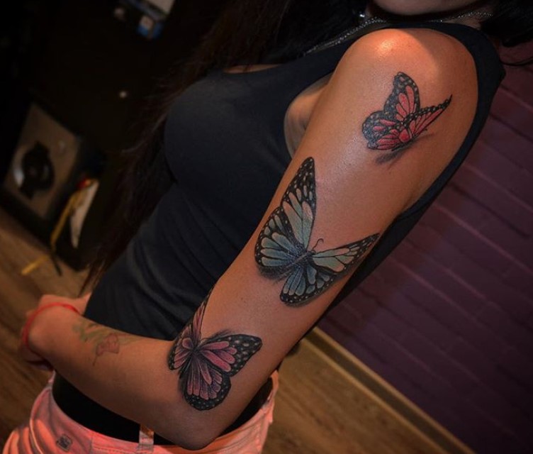 Three 3D butterfly tattoo on sleeve