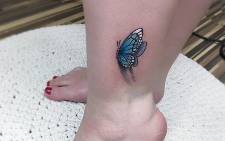 3D butterfly tattoo on ankle