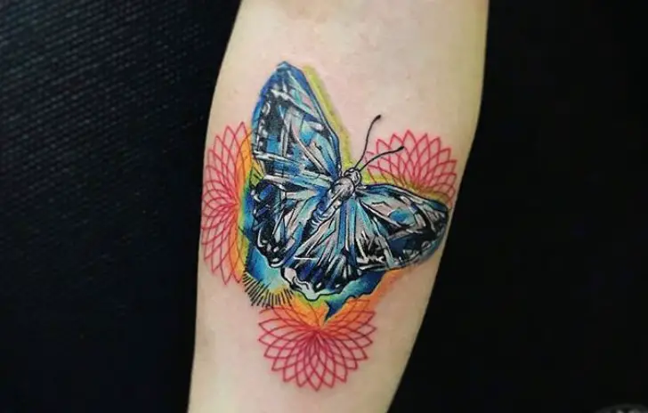 Cool and creative butterfly tattoo on forearm