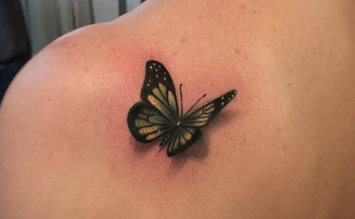 3D butterfly tattoo on shoulder