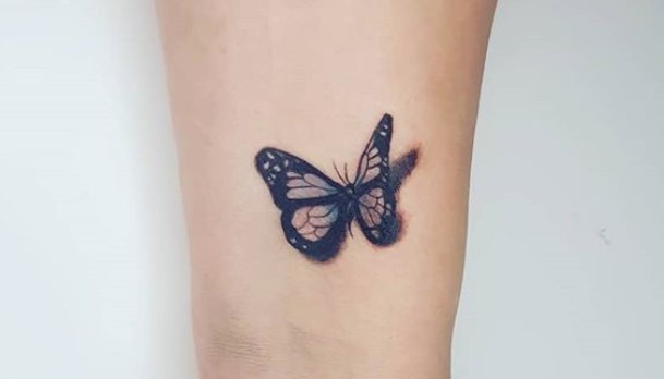 3D outline butterfly tattoo on wrist