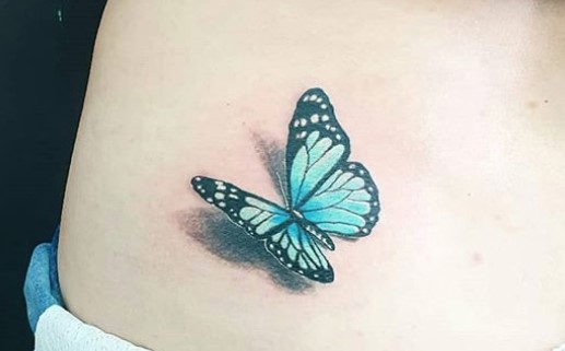 Blue 3D butterfly tattoo