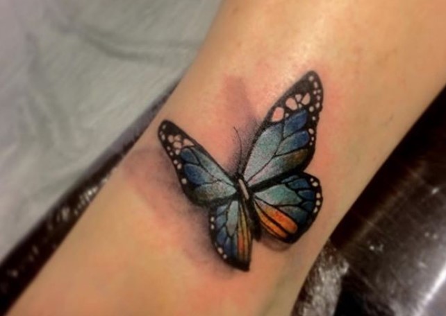 Colorful 3D butterfly tattoo