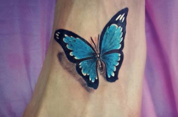 Blue butterfly tattoo