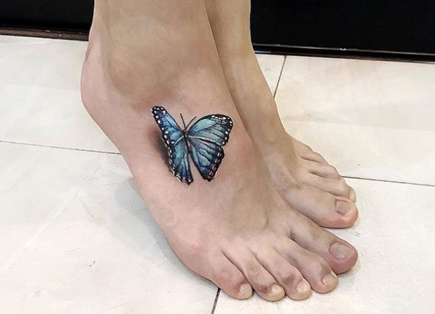 3D butterfly tattoo on feet