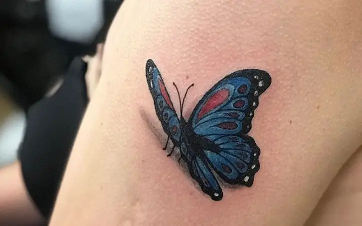 Blue and red 3D butterfly tattoo