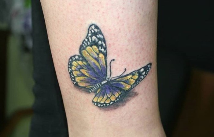 Yellow and Blue butterfly tattoo