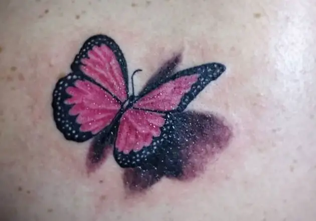 Pink 3D butterfly tattoo