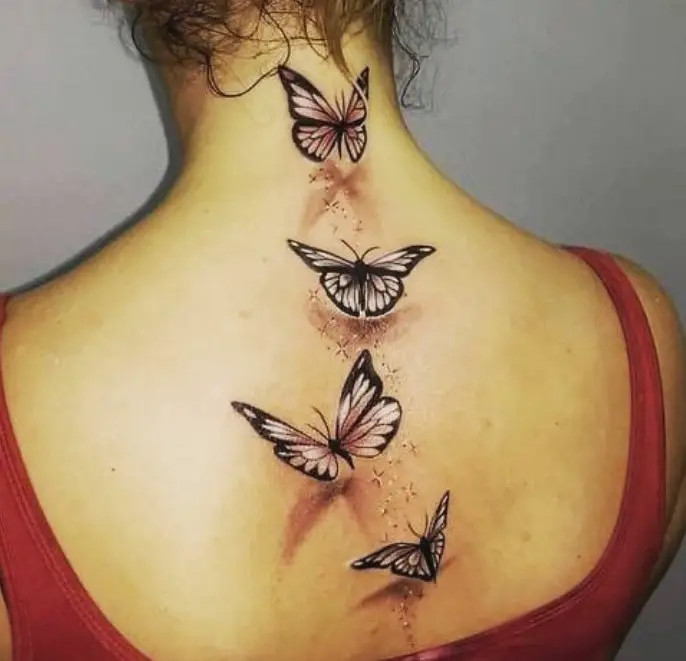 4 Pink butterfly tattoos on the back
