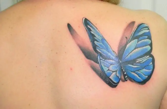 3D blue butterfly tattoo on back