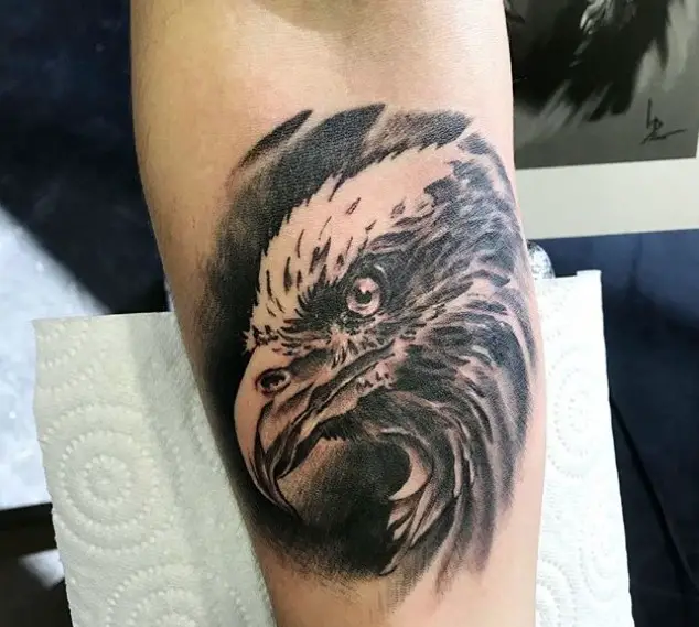 3D black and gray Eagle head Tattoo on the forearm