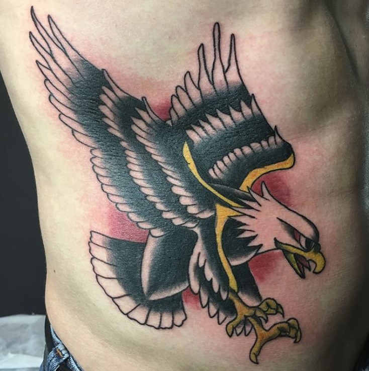 American traditional eagle tattoo on the side of the body