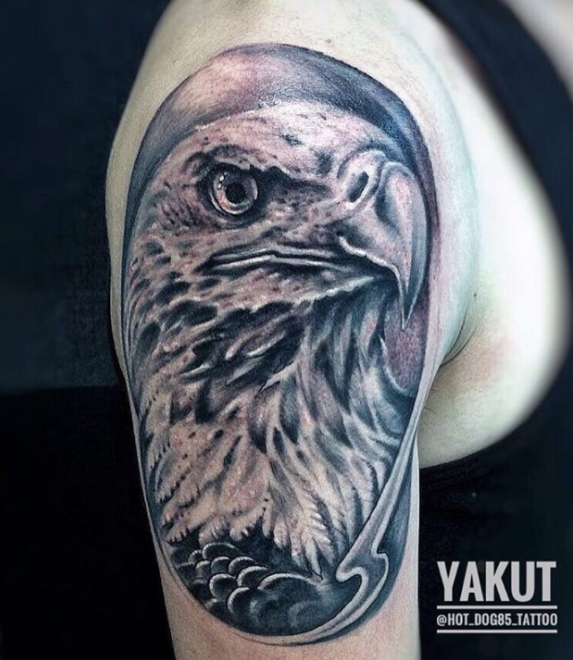 black and gray realistic head of an Eagle Tattoo on the shoulder