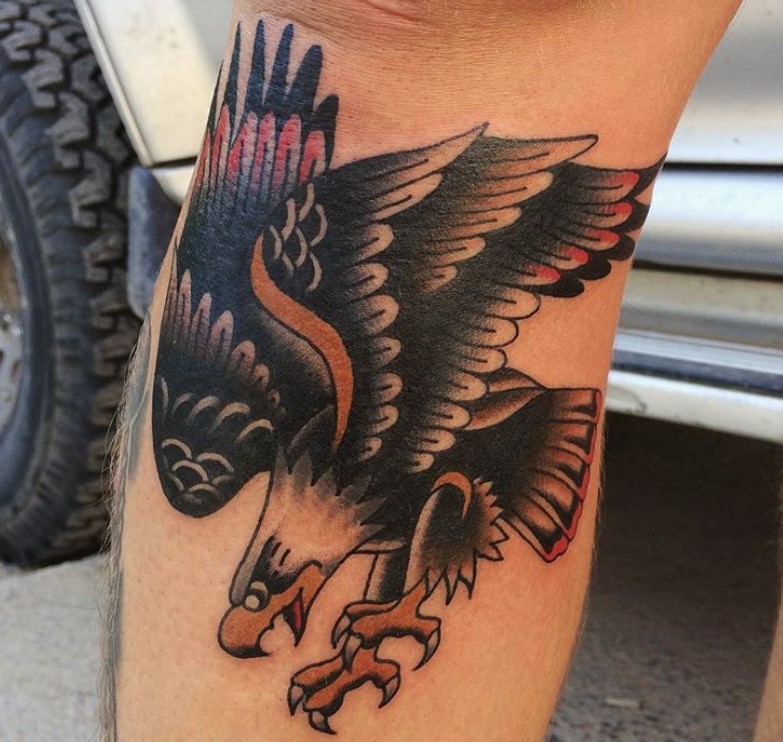 Traditional eagle tattoo on the leg