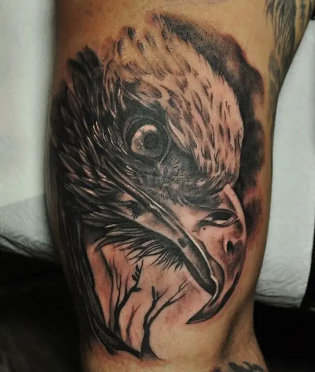 3D black and gray head of an Eagle Tattoo on thighs