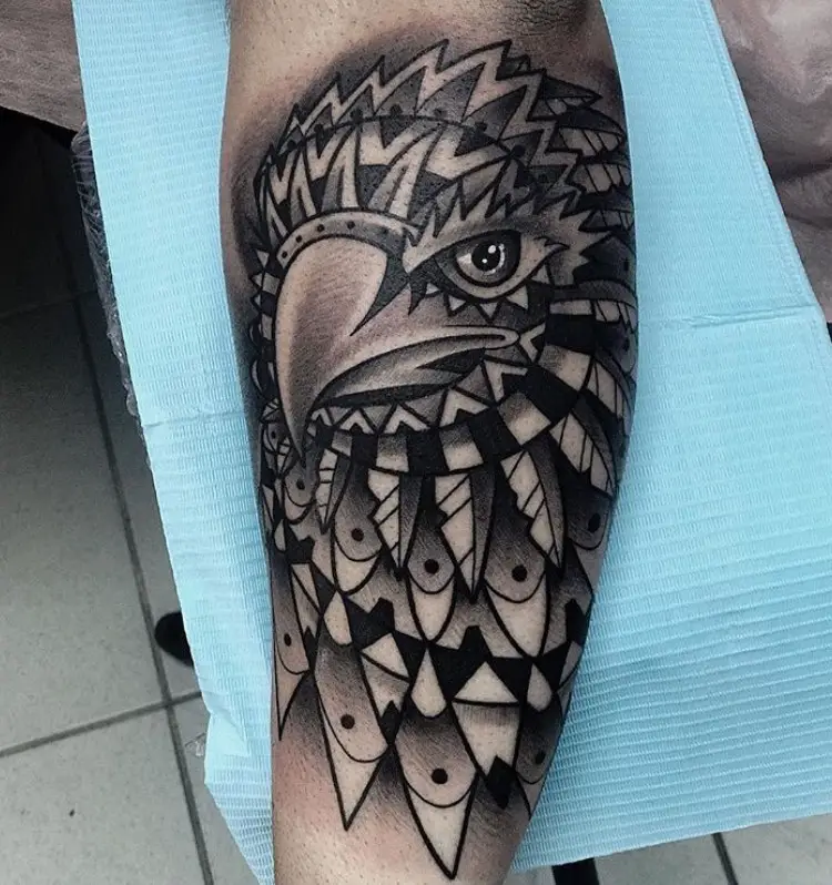 3D tribal tattoo of an Eagle's head tattoo on the leg
