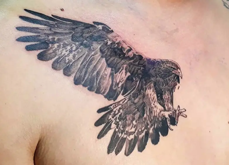 3D black and gray tattoo of a flying eagle on the chest