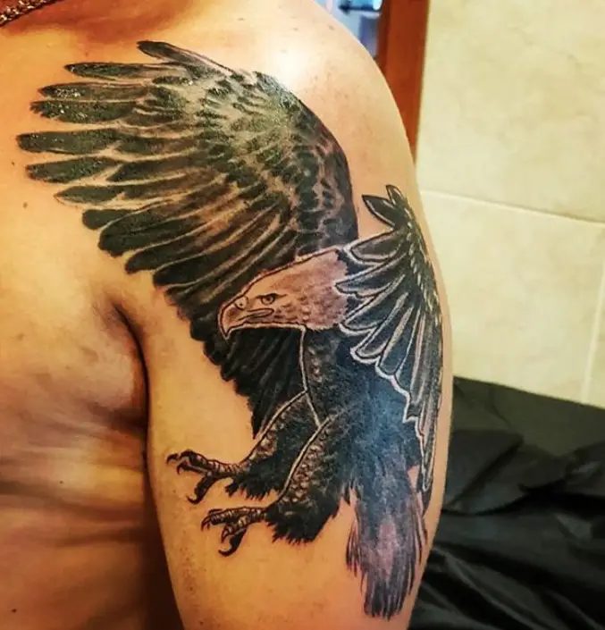 black and white landing Eagle Tattoo on the shoulder