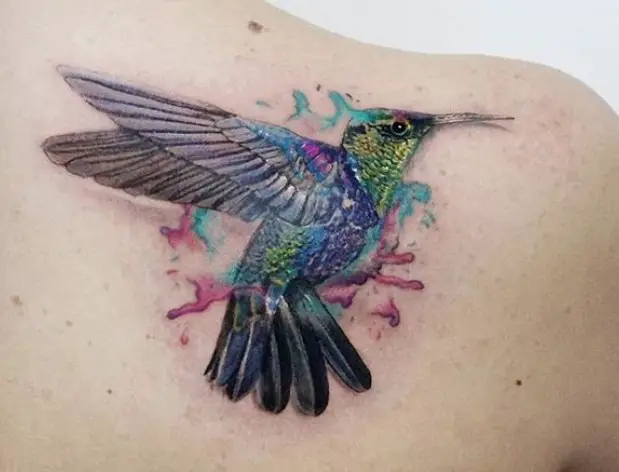 3D hummingbird watercolor tattoo on back