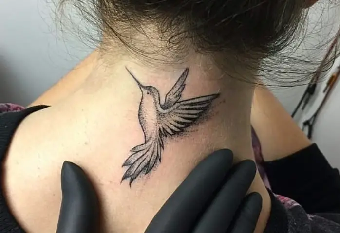hummingbird tattoo on neck