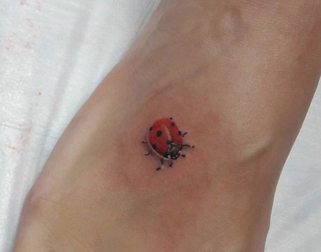 small Ladybug Tattoo on foot
