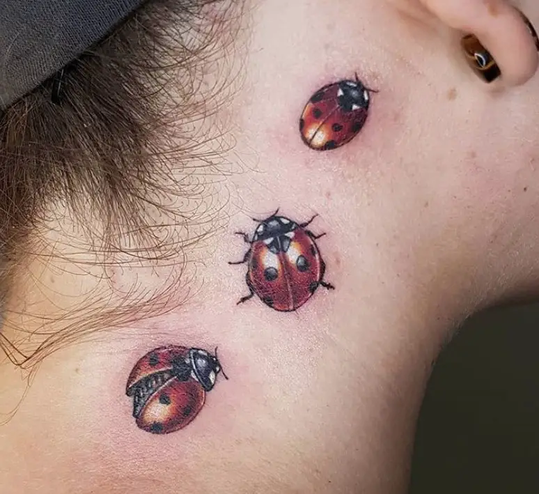 three Ladybugs Tattoo on neck