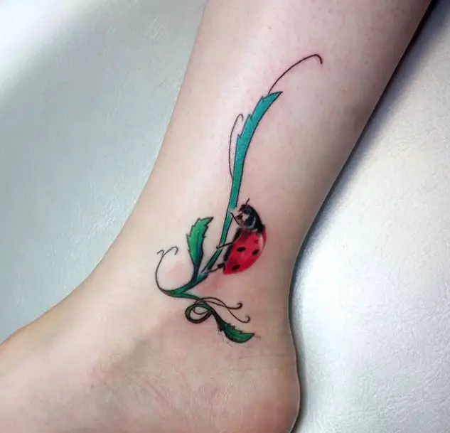 Ladybug on a leaf Tattoo on the ankle