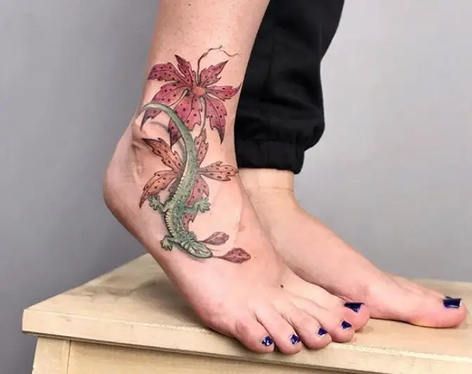 green Lizard on top of a leaves Tattoo on foot
