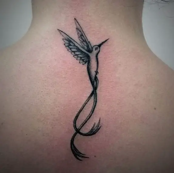 outline of Small Hummingbird with long tail Tattoo on the back