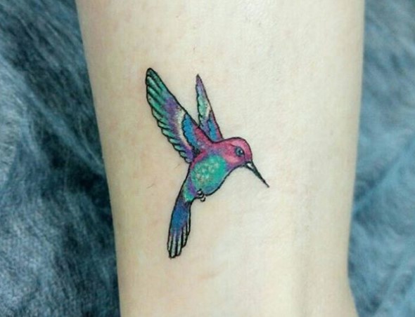 colorful Small Hummingbird Tattoo on the ankle