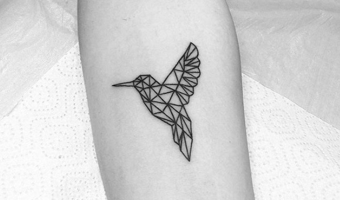 geometric Small Hummingbird Tattoo on the forearm