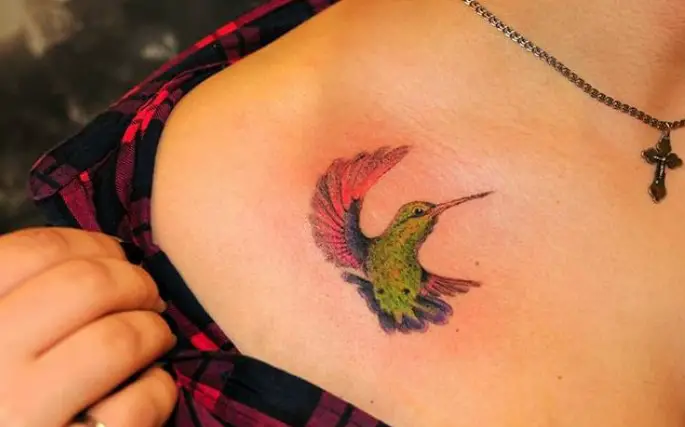 colorful Small Hummingbird Tattoo on the chest