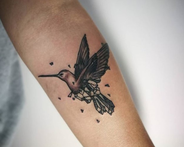 black geometric Small Hummingbird Tattoo on the forearm